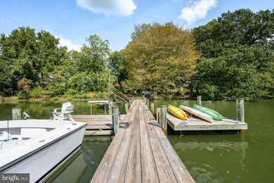 Set along the peaceful waters of Caulk Cove, this extraordinary - photo 36