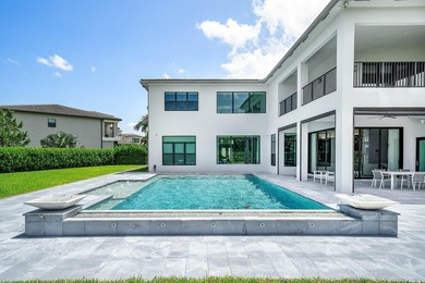 Nestled behind the prestigious gates of Boca Bridges, this - photo 38