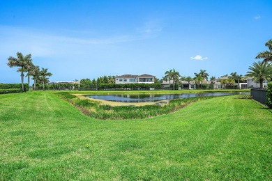 Nestled behind the prestigious gates of Boca Bridges, this - photo 41