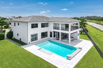 Nestled behind the prestigious gates of Boca Bridges, this - photo 42