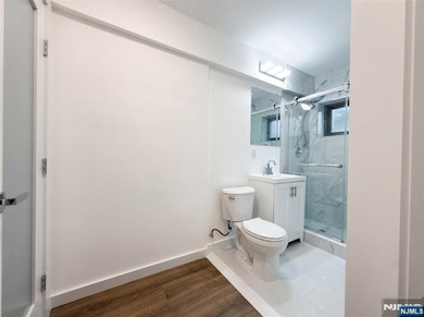 CALL BRANDON ESPERpletely renovated first-floor studio located - photo 8