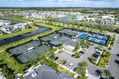 Nestled behind the prestigious gates of Boca Bridges, this - photo 49