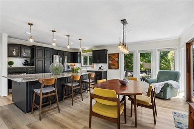 Beautiful 1.5 story home with rare attached 2 car garage in this - photo 2