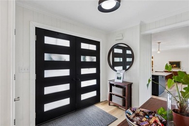 Beautiful 1.5 story home with rare attached 2 car garage in this - photo 7