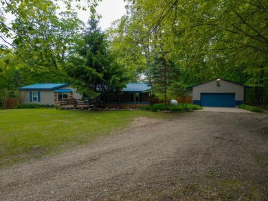 Nestled along the beautiful Muskegon River, this charming 2-bd - photo 3