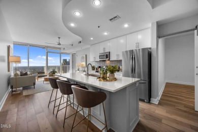 Welcome to this stunning 2-bedroom, 2-bath condo perched on the
