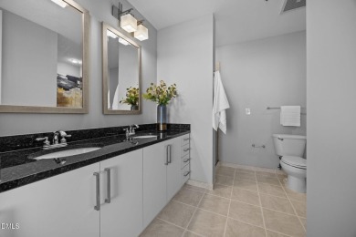 Welcome to this stunning 2-bedroom, 2-bath condo perched on the