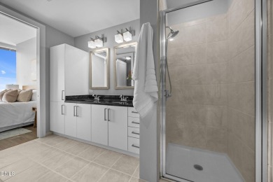 Welcome to this stunning 2-bedroom, 2-bath condo perched on the