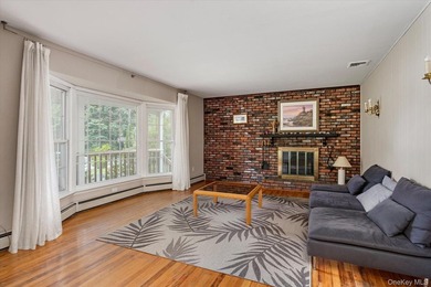 Nestled on a quiet half-acre lot in one of Stony Brook's most - photo 2