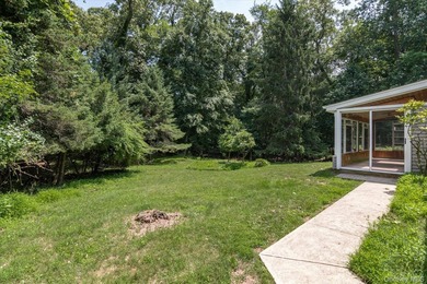 Nestled on a quiet half-acre lot in one of Stony Brook's most - photo 9