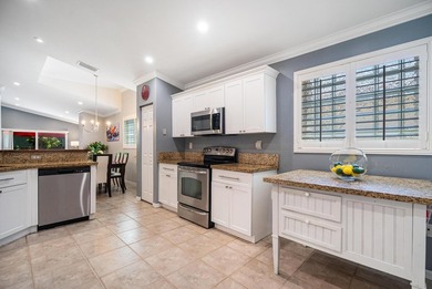 Welcome to this charming residence in the highly desirable gated - photo 9