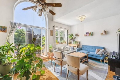 Welcome to 41 Claver Place, a remarkable three-family townhouse - photo 1