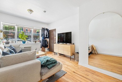 Welcome to 41 Claver Place, a remarkable three-family townhouse - photo 2