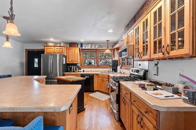 Escape to the Northwoods with this inviting half-log home on - photo 11