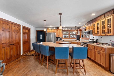 Escape to the Northwoods with this inviting half-log home on - photo 12