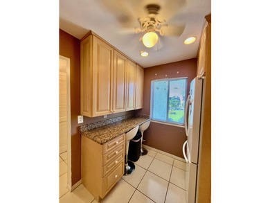 Welcome to this charming two-bedroom, two-bathroom condominium - photo 12