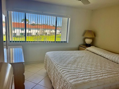 Welcome to this charming two-bedroom, two-bathroom condominium - photo 15