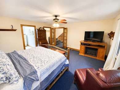 Escape to the Northwoods with this inviting half-log home on - photo 17