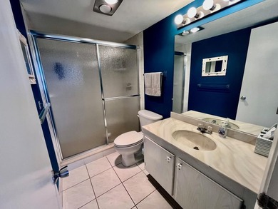 Welcome to this charming two-bedroom, two-bathroom condominium - photo 17