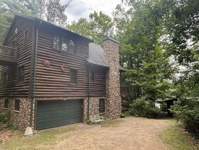 Escape to the Northwoods with this inviting half-log home on - photo 22