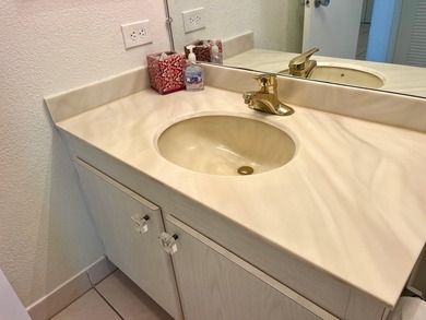 Welcome to this charming two-bedroom, two-bathroom condominium - photo 26