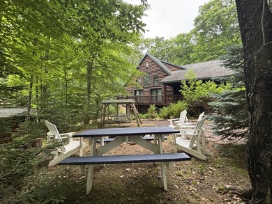 Escape to the Northwoods with this inviting half-log home on - photo 33