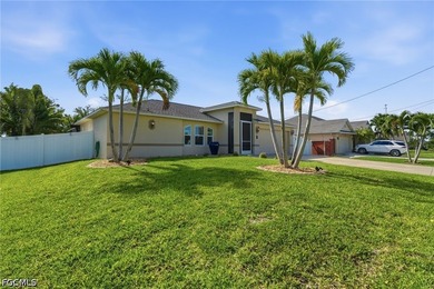Welcome Home to 317 SW 25th Avenue, Cape Coral! This beautifully - photo 3