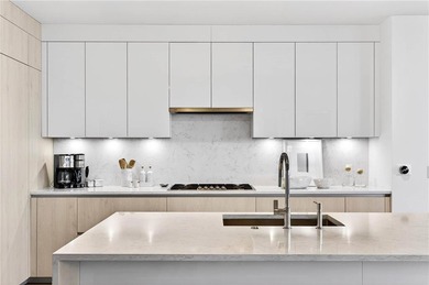 Positioned as a refined corner residence, this professionally