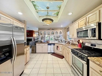 Set against the mountainside in prestigious Ridgeview Estates