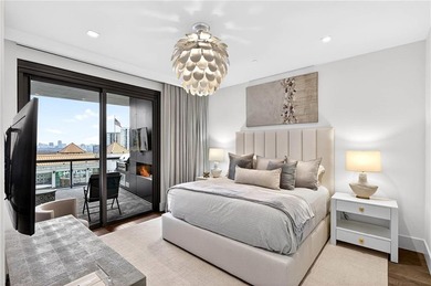 Positioned as a refined corner residence, this professionally