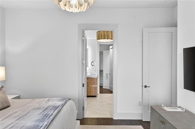 Positioned as a refined corner residence, this professionally