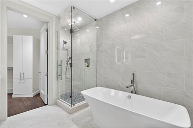 Positioned as a refined corner residence, this professionally