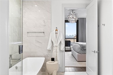 Positioned as a refined corner residence, this professionally