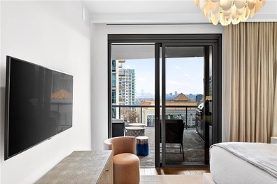 Positioned as a refined corner residence, this professionally