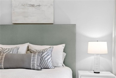 Positioned as a refined corner residence, this professionally