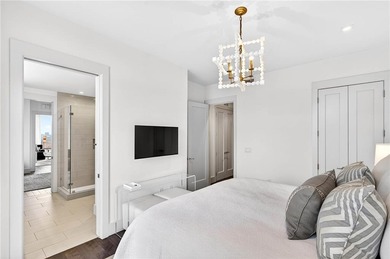 Positioned as a refined corner residence, this professionally