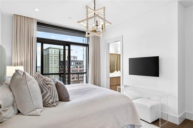 Positioned as a refined corner residence, this professionally