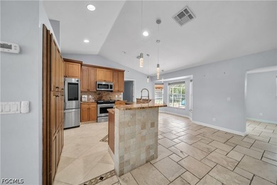 Welcome to this beautifully maintained 4-bedroom, 2-bathroom - photo 10