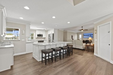 This beautifully maintained waterfront property offers a rare - photo 5