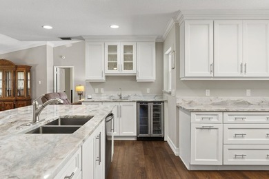This beautifully maintained waterfront property offers a rare - photo 7