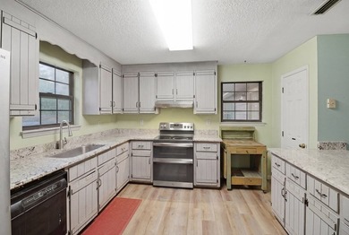 Nestled on approximately 36.5 acres in Gordon, Alabama, this - photo 12