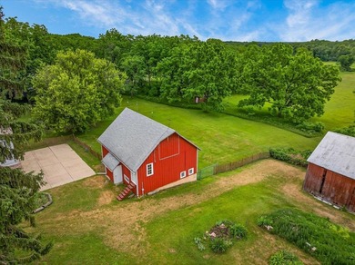 Classic Wisconsin farmhouse & outbuildings on 33+ acres in - photo 2