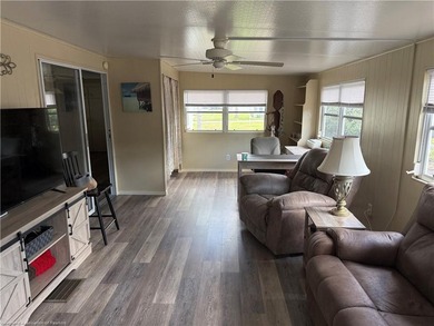Welcome to Lakeside Village! An active 55+ community where - photo 3