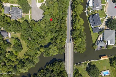 Wooded cul-de-sac lot in sought-after Bayou View. Deeded water - photo 4