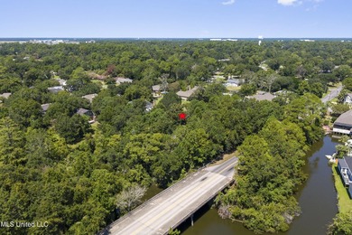 Wooded cul-de-sac lot in sought-after Bayou View. Deeded water - photo 10