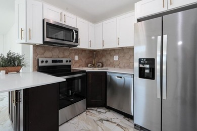 Step into a home where *renovated* is an understatement-it's - photo 7