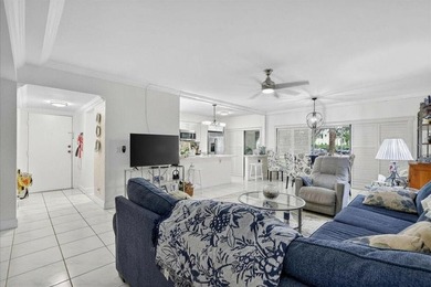 This spacious 2/2 ground-floor condo offers the perfect blend of - photo 5