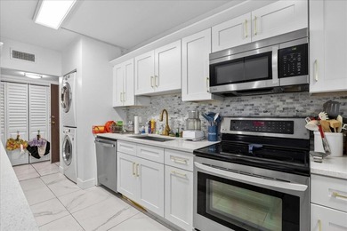 This spacious 2/2 ground-floor condo offers the perfect blend of - photo 8