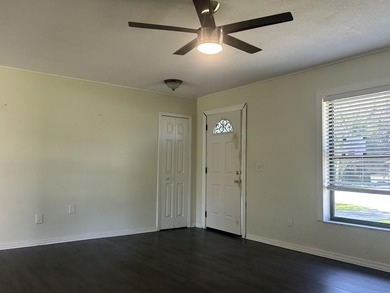 Discover this solid 2-bedroom, 2-bath CBS home with a 1-car - photo 3