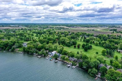 Perfectly positioned on the south shore of Lake Kegonsa, this - photo 3